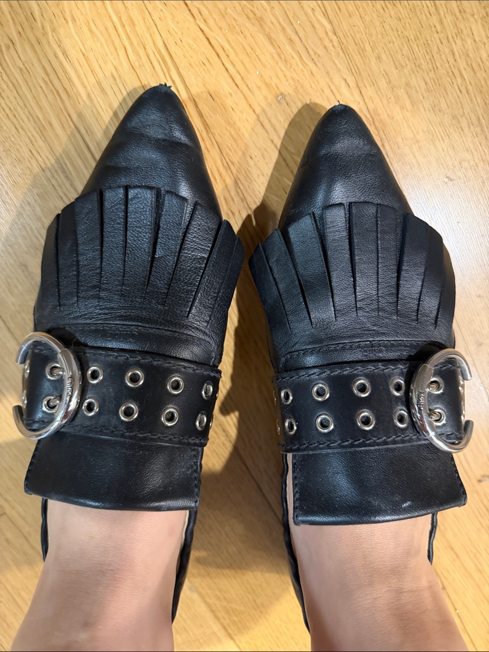 Chloe Black Pointed Fringe Loafers with Silver Buckles